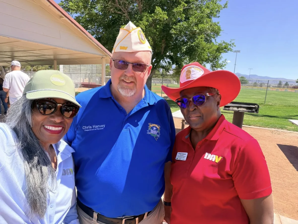 DAV members at a Chapter 12 outdoor event, wearing DAV polo shirts and apparel.